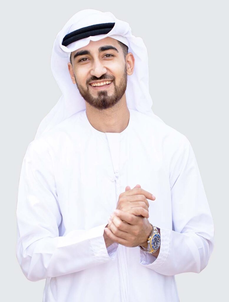 handsome young emirati man in traditional UAE clothing