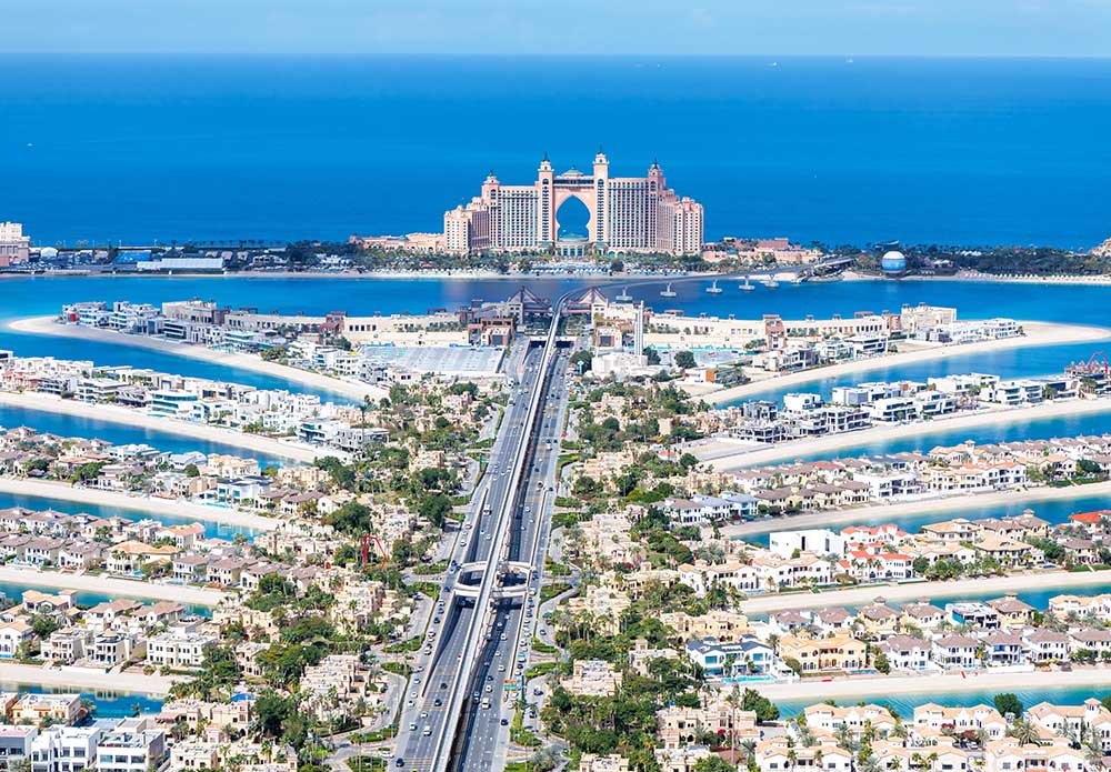 Dubai The Palm Jumeirah with Atlantis Hotel artificial island from above luxury