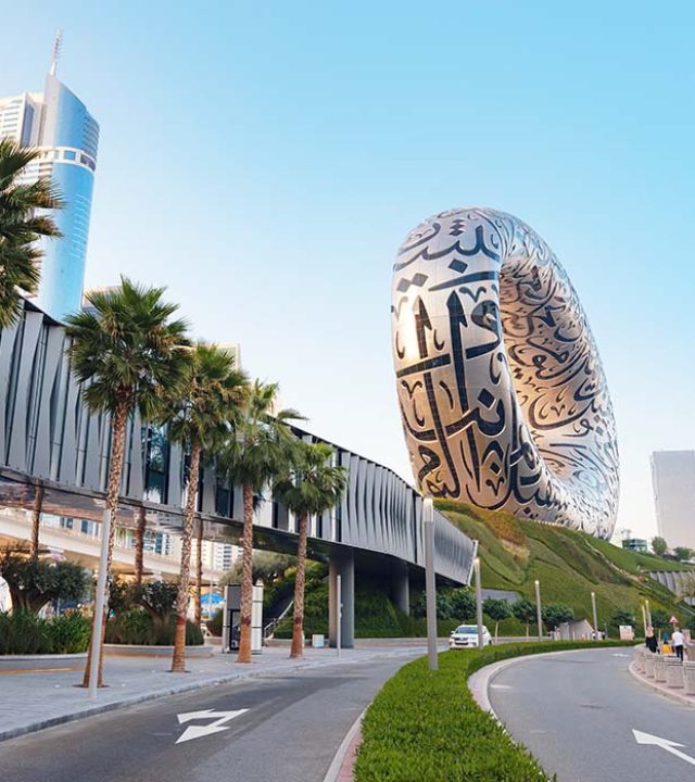 25 March 2023, Dubai, UAE: Museum of future. Sunset time View. Unique close up perspective. Cityscape skyline. Urban background. tourist trip to futuristic dubai 25 March 2023, Dubai, UAE: Museum of future. Sunset time View. Unique close up perspective. Cityscape skyline. Urban background. tourist trip to futuristic dubai